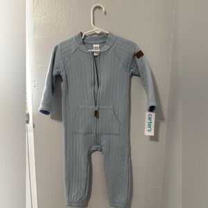 One piece zip up with packets and open feet